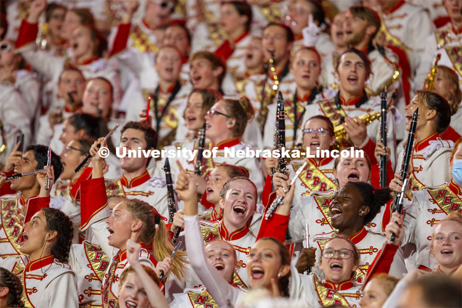 The Cornhusker Marching Band is in the stands cheering on the Husker Football team. Nebraska vs Northwestern University homecoming game. October 2, 2021. Photo by Craig Chandler / University Communication.