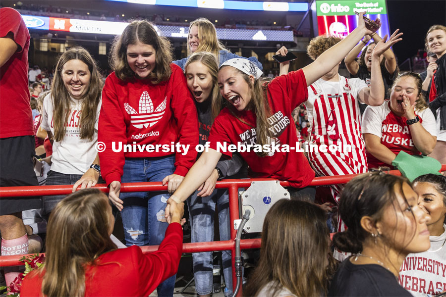 Friends of Leigh Jahnke of West Point congratulate her on being named homecoming royalty at the University of Nebraska–Lincoln. Nebraska vs Northwestern University homecoming game. October 2, 2021. Photo by Craig Chandler / University Communication.
