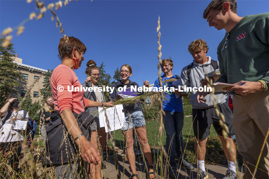 Kim Todd describes various landscape grasses as her HORT  214, Herbaceous Landscape Plants class walks around East Campus. October 4, 2021. Photo by Craig Chandler / University Communication.