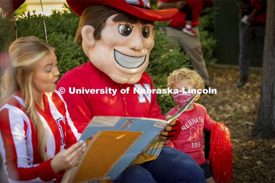 To celebrate Campus Childcare Centers Week at the Ruth Staples Child Development Lab, Herbie Husker, the children, teachers, sprit squad members and band members had a parade from the flagpole by Chase Hall to Ag Hall. October 4, 2021. Photo by Craig Chandler / University Communication.