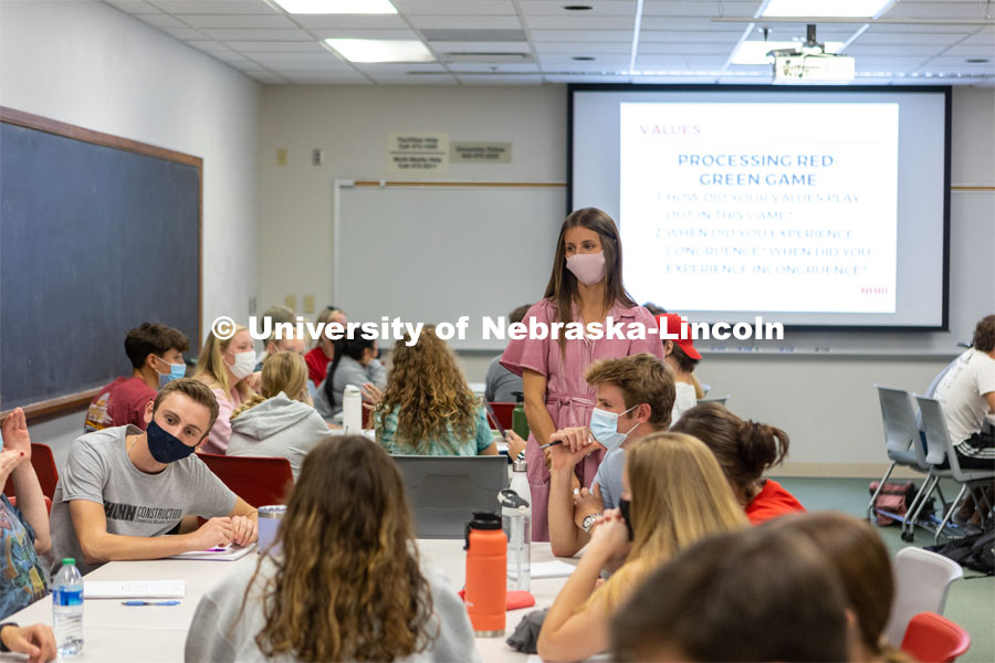 Hannah Sunderman, Program Director, NHRI Leadership Mentoring and Professor of Practice, works with her ALEC 102 Interpersonal Skills for Leadership class. They were doing a values game. October 7, 2021. Photo by Abby Durheim for University Communication.
