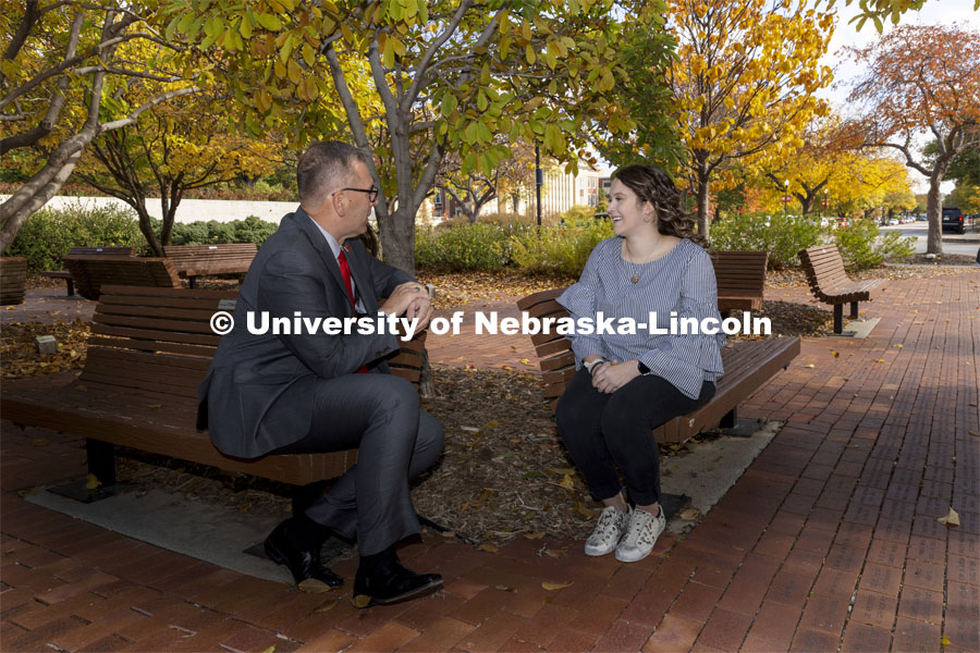 Chancellor Ronnie Green and  Maddie Swanson talk over their first-gen college experiences. November 4, 2021. Photo by Craig Chandler / University Communication