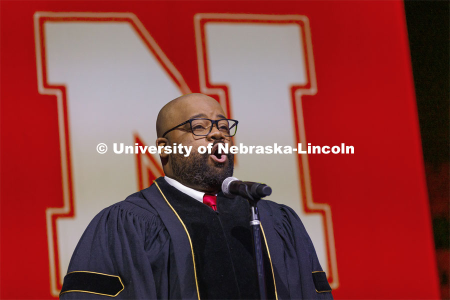 Alfonzo Cooper, Jr., a 2020 music doctorate, sings the National Anthem. Graduate Commencement at Pinnacle Bank Arena. December 17, 2021. Photo by Craig Chandler / University Communication.