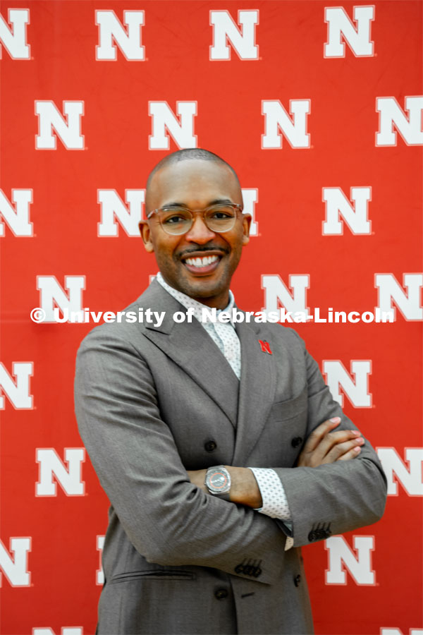 Marco Barker, Vice Chancellor, Diversity and Inclusion, poses in front of the Nebraska N backdrop at the MLK Commemorative Celebration 2022. January 19, 2022. Photo by Jonah Tran / University Communication.