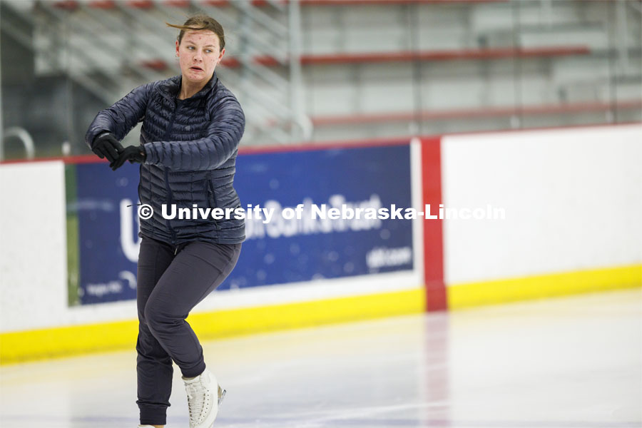 Michaela Andrusko, a senior from Otsego, Minnesota, and president of the UNL figure skating club, works out on the ice at the Breslow Ice Hockey Center. February 1, 2022. Photo by Craig Chandler / University Communication.