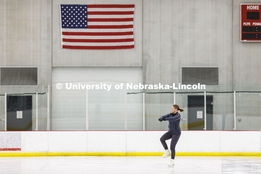 Michaela Andrusko, a senior from Otsego, Minnesota, and president of the UNL figure skating club, works out on the ice at the Breslow Ice Hockey Center. February 1, 2022. Photo by Craig Chandler / University Communication.