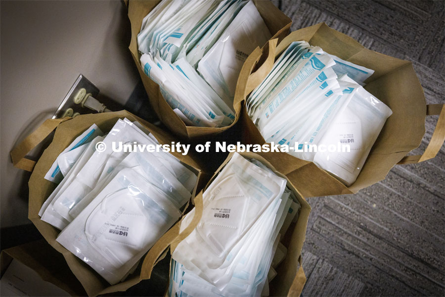 KN95 Masks await pickup in the IFC offices. 150,000 KN95 masks are being distributed on campus this week with each person being given 4 masks. February 1, 2022. Photo by Craig Chandler / University Communication.