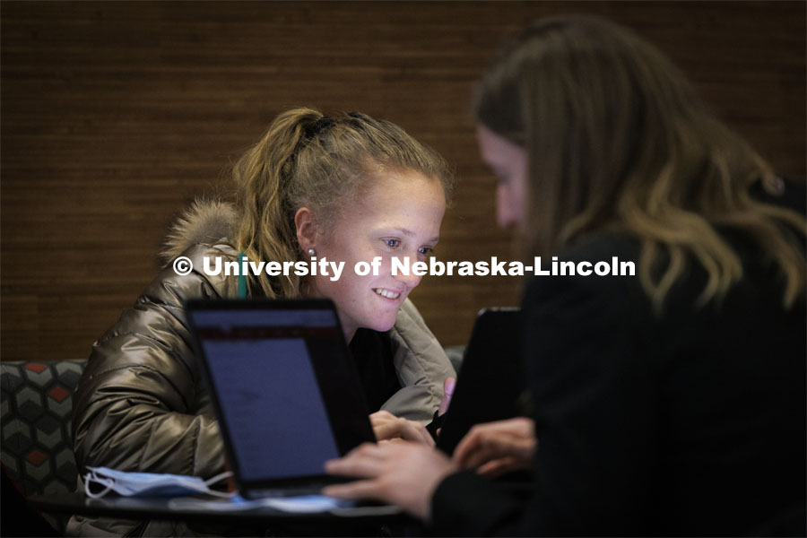 Vivien Sandberg, a sophomore business major studies in the Nebraska Union. February 14, 2022. Photo by Craig Chandler / University Communication.