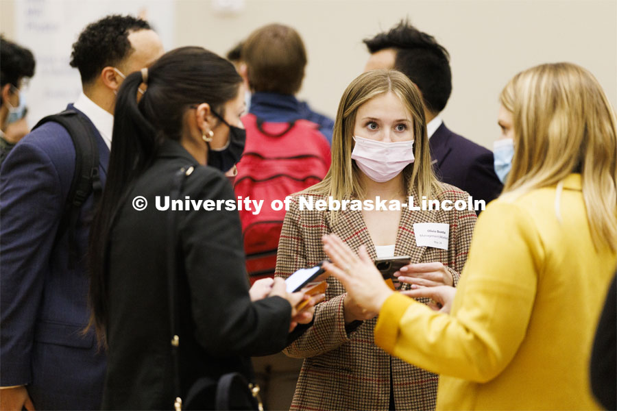 Olivia Bonta listens to opportunities at the UNL Spring Career Fair in the Nebraska Union. February 14, 2022. Photo by Craig Chandler / University Communication.