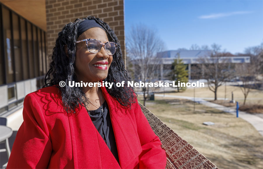 Nebraska's Reshell Ray’s passion for supporting students shines in her work assisting with campus event planning through the Office of Student Leadership, Involvement and Community Engagement. Ray is pictured looking out from the Nebraska East Union balcony outside the third-floor offices. February 18, 2022. Photo by Craig Chandler / University Communication.