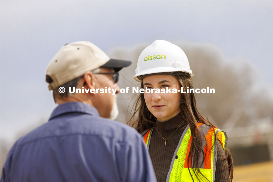 Tessa Yackley, junior in civil engineering, is a member of the UNL Society of Women Engineers who currently interns with Olsson Associates. Yackley, talks with Jim Holz, waste water plant operator at Lincoln’s Northeast Wastewater Treatment Facility. Yackley wants to apply her engineering skills to waste water management because she believes clean water is so vital to everyone. March 4, 2022. Photo by Craig Chandler / University Communication.