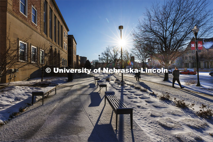 Benches on the south side of the Union are covered in a dusting of snow. Huskers woke up Monday morning to an inch of snow. March 7, 2022. Photo by Craig Chandler / University Communication.