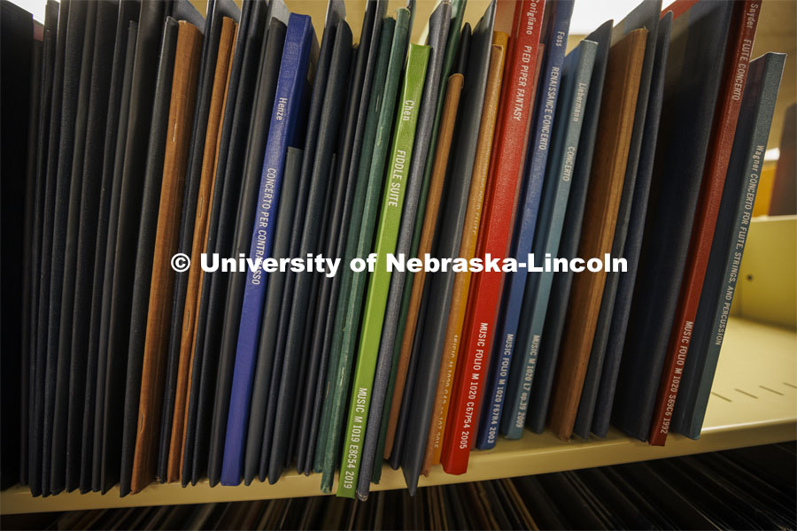 Approximately 3,000 scores of scores line the shelves in the library. Anita Breckbill, professor, oversees the Hixon-Lied School of Fine and Performing Arts music library in the basement of the Westbrook Music Center. March 18, 2022. Photo by Craig Chandler / University Communication.