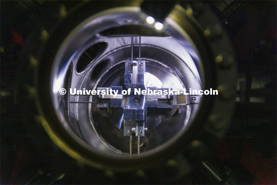 A sample is supported in a modular high vacuum laser processing system in Craig Zuhlke’s lab. College of Engineering photo shoot. March 22, 2022. Photo by Craig Chandler / University Communication.