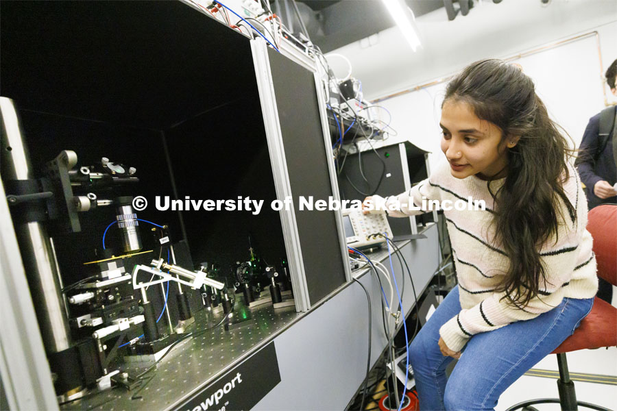 Suvechhya Lamichhane works with diamond quantum sensing microscopes in Abdelghani Laraoui’s lab. College of Engineering photo shoot. March 22, 2022. Photo by Craig Chandler / University Communication.