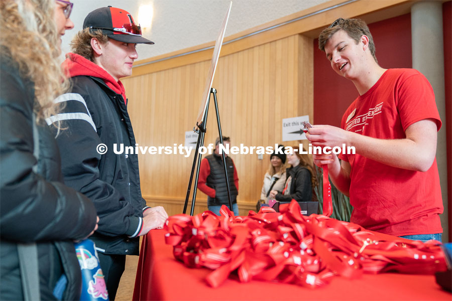 Students check in at the Van Brunt Visitor’s Center and pick up free swag. Admitted Student Day is UNL’s in-person, on-campus event for all admitted students. March 26, 2022. Photo by Jordan Opp for University Communication.