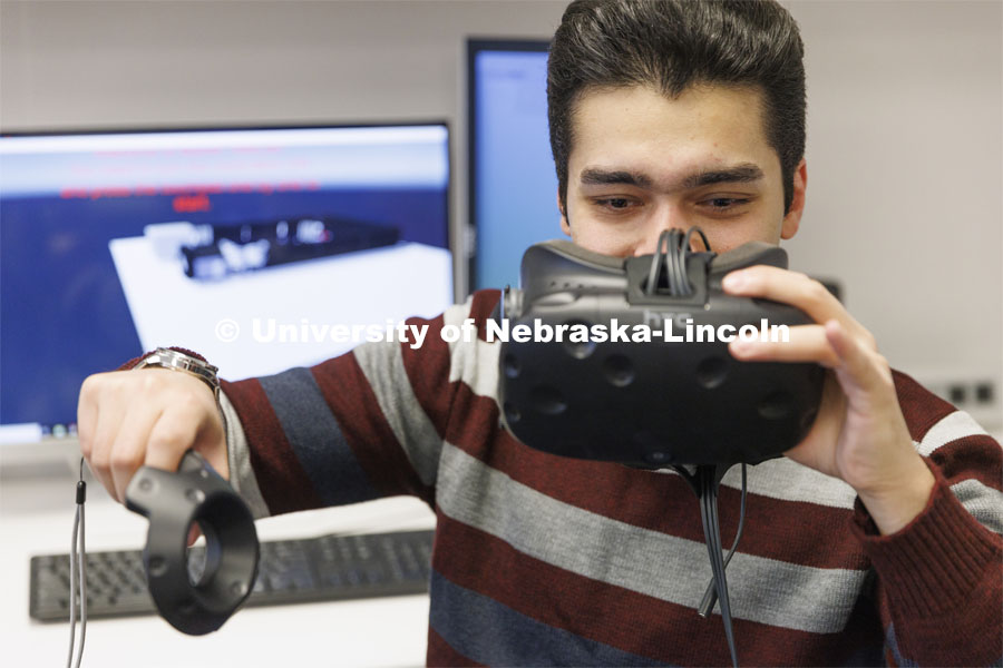 Pejman Ghasemzadeh works on a virtual reality project in Hamid Sherif’s Telecom lab. College of Engineering photo shoot at Peter Kiewit Institute in Omaha. April 5, 2022. Photo by Craig Chandler / University Communication.