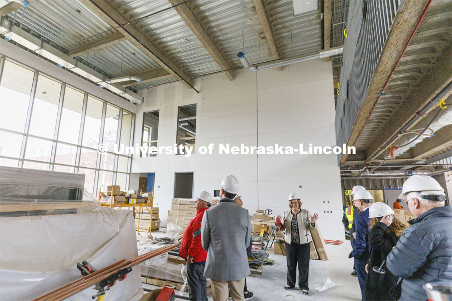 College of Education and Human Sciences Dean Sherri Jones describes the open space called the “living room” in the under-construction education building. Board of Regents tour of UNL. April 7, 2022. Photo by Craig Chandler / University Communication.