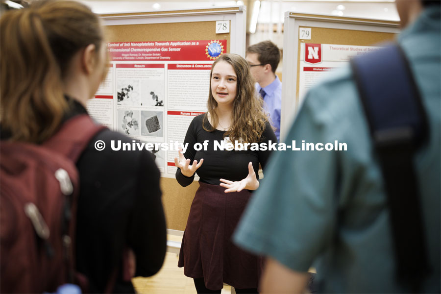 Maggie Ramsey talks about her chemistry research project. Undergraduate Student Poster Session in the Nebraska Union ballroom as part of Student Research Days. April 11, 2022. Photo by Craig Chandler / University Communication.