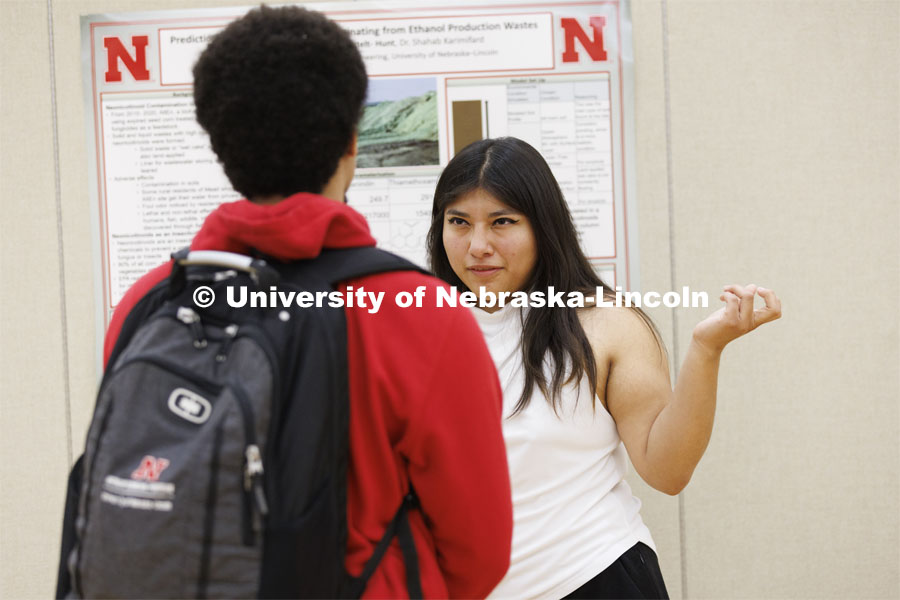 Stephanie Perez discusses the civil engineering research. Undergraduate Student Poster Session in the Nebraska Union ballroom as part of Student Research Days. April 11, 2022. Photo by Craig Chandler / University Communication.