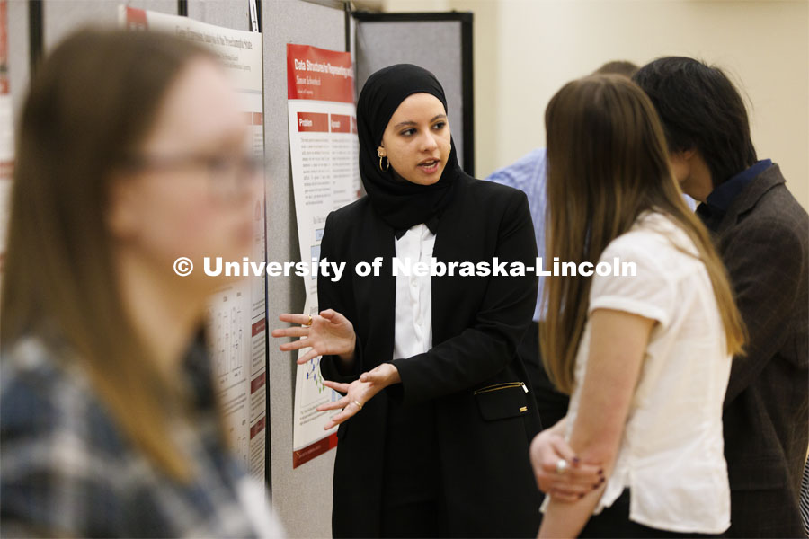 Noha Algahimi talks about her research on gene expression analysis. Undergraduate Student Poster Session in the Nebraska Union ballroom as part of Student Research Days. April 11, 2022. Photo by Craig Chandler / University Communication.