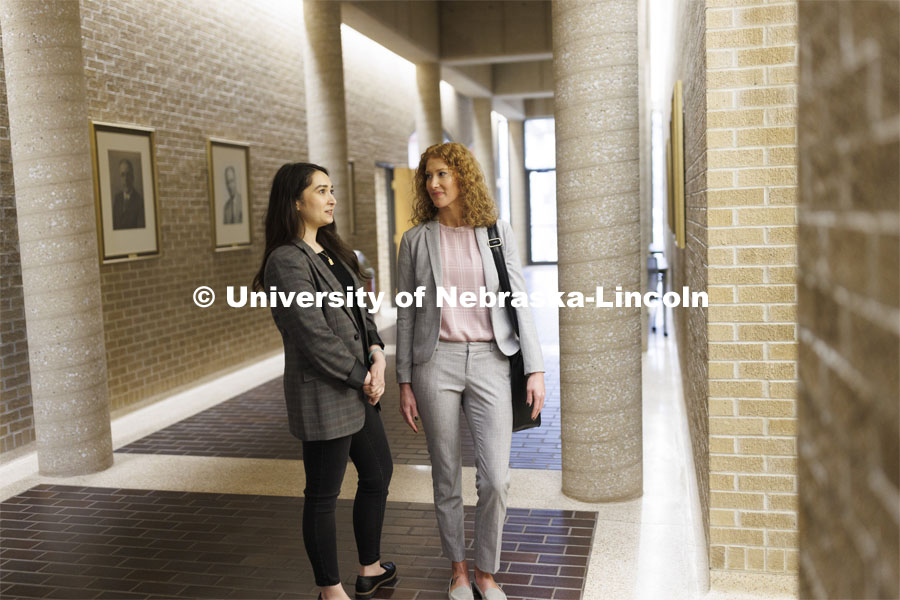 Students walking to class in McCollum Hall. College of Law photo shoot. April 20, 2022. Photo by Craig Chandler / University Communication.