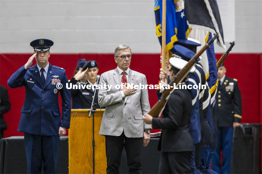 Air Force Lieutenant Colonel C J Zaworski and UNL Chancellor Ronnie Green salute the colors as they pass in review. ROTC Joint Service Chancellor’s Review in Cook Pavilion. April 21, 2022. Photo by Craig Chandler / University Communication.