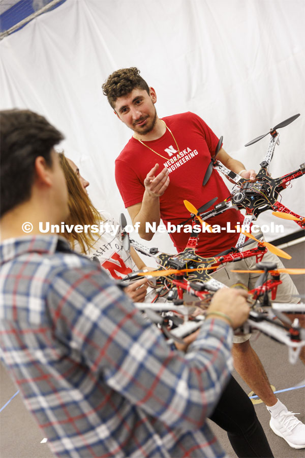 Santiago Giraldo discusses UAVs in the NIMBUS lab. College of Engineering photoshoot in the School of Computing.  April 22, 2022. Photo by Craig Chandler / University Communication.
