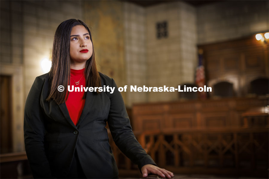 Ashly Felipe-Espino is a junior who plans to attend law school and specialize as an immigration lawyer. She is photographed in the Nebraska Supreme Court. Photos are for ASEM CoCreate story. April 26, 2022. Photo by Craig Chandler / University Communication.