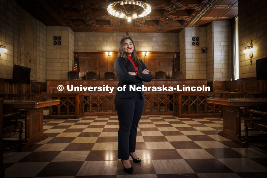 Ashly Felipe-Espino is a junior who plans to attend law school and specialize as an immigration lawyer. She is photographed in the Nebraska Supreme Court. Photos are for ASEM CoCreate story. April 26, 2022. Photo by Craig Chandler / University Communication.