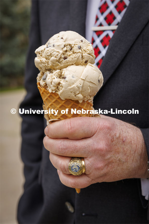 President Ted Carter of the University of Nebraska enjoys an ice cream cone of Carter’s Coffee Crunch, named for the new president. May 4, 2022. Photo by Craig Chandler / University Communication.