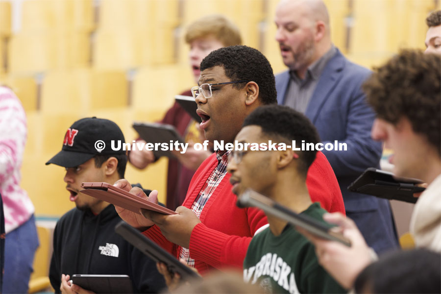 Jayven Brandt sings during Chamber Singers practice in Westbrook Music Hall. ASEM CoCreate story. May 5, 2022. Photo by Craig Chandler / University Communication.