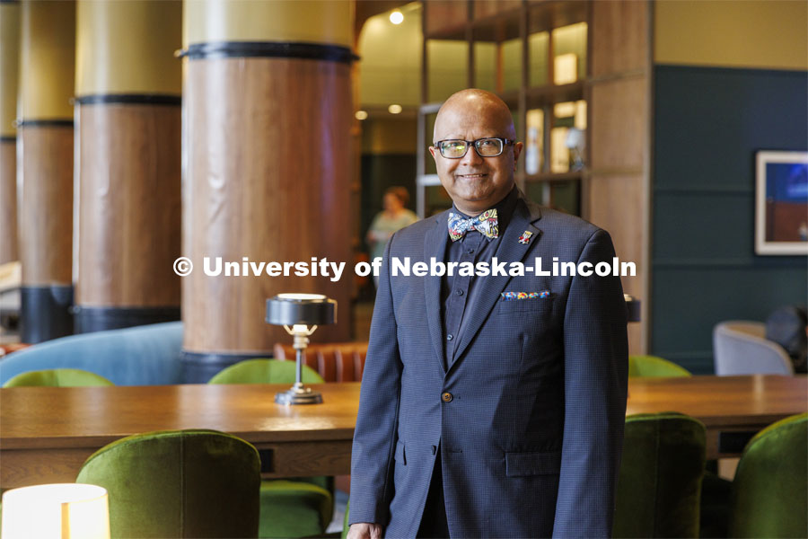 Dipra Jha stands inside the completed Scarlet Hotel. As a HTRM professor, he was instrumental at getting the hotel built as a teaching hotel. Ribbon cutting for the new Scarlet Hotel in Nebraska Innovation Campus. March 6, 2021. Photo by Craig Chandler / University Communication.