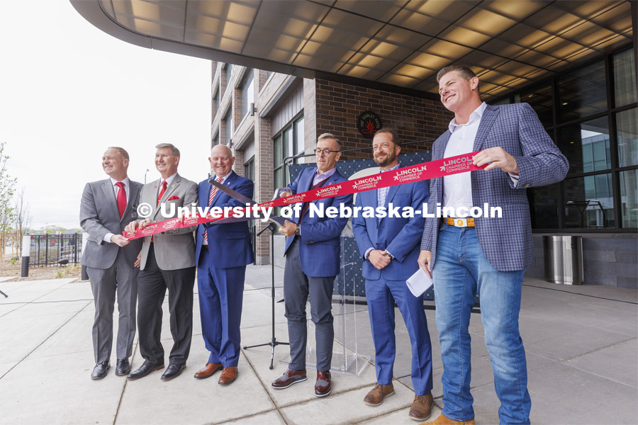 UNL Chancellor Ronnie Green cuts the ribbon for the new hotel. Ribbon cutting for the new Scarlet Hotel in Nebraska Innovation Campus. March 6, 2021. Photo by Craig Chandler / University Communication.