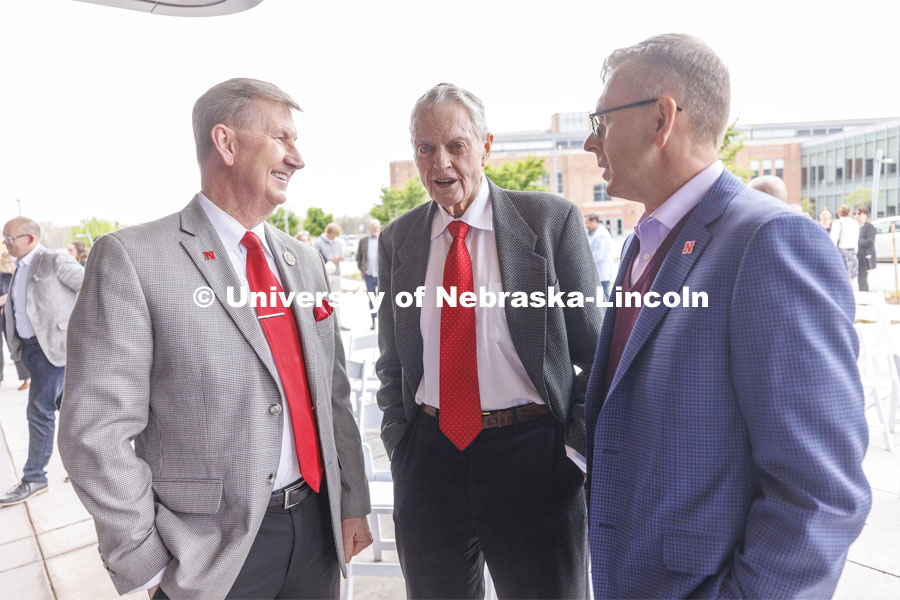 NU President Ted Carter, Former Husker football coach Tom Osborne, and UNL Chancellor Ronnie Green talk following the ribbon cutting. Ribbon cutting for the new Scarlet Hotel in Nebraska Innovation Campus. March 6, 2021. Photo by Craig Chandler / University Communication.