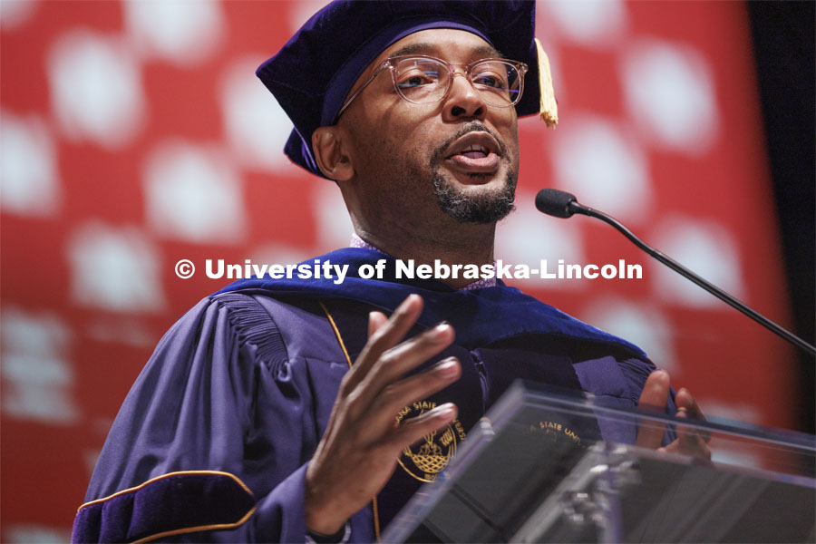 Marco Barker, Vice Chancellor for Diversity and Inclusion, delivers the commencement address. Graduate commencement in Pinnacle Bank Arena. May 13, 2022. Photo by Craig Chandler / University Communication.