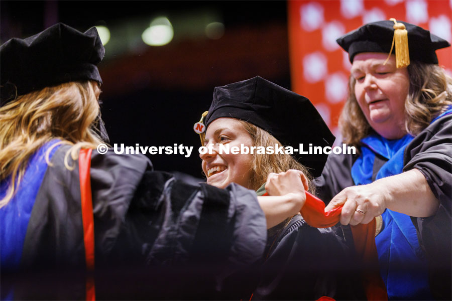 Jamie Koch smiles after receiving her doctor of audiology degree. Graduate commencement in Pinnacle Bank Arena. May 13, 2022. Photo by Craig Chandler / University Communication.