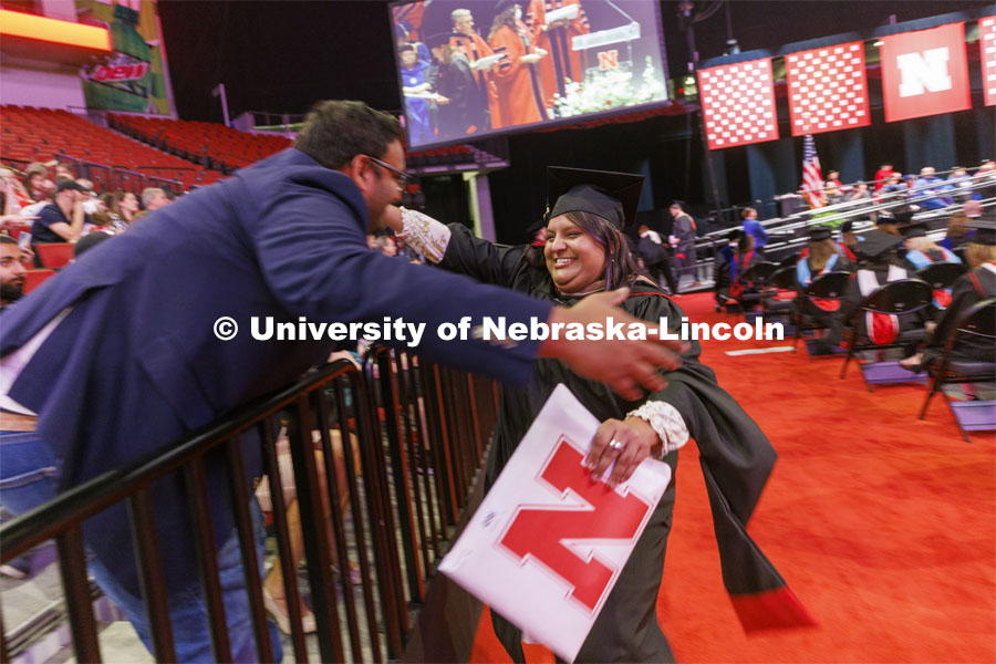 Aakriti Agrawal hugs her brother, Akshay, after she received here MBA. Graduate commencement in Pinnacle Bank Arena. May 13, 2022. Photo by Craig Chandler / University Communication.