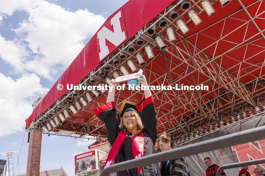 CASNR grad Kayla Schroeder was the next to the last graduate to walk the stage. UNL undergraduate commencement in Memorial Stadium. May 14, 2022. Photo by Craig Chandler / University Communication.