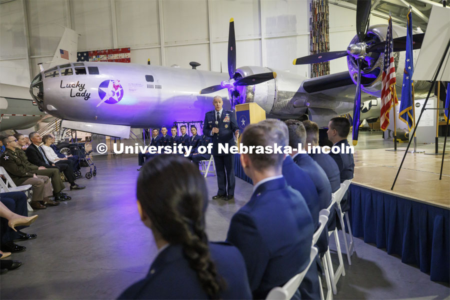Lt. Gen. Thomas A Bussiere addresses the audience with a World War II era B-29 as a backdrop. Lt. Gen Bussiere is the Deputy Commander, United States Strategic Command, Offutt Air Force Base. The university’s Air Force ROTC detachment held a commissioning for May graduates at the Strategic Air Command and Aerospace Museum in Ashland. May 16, 2022. Photo by Craig Chandler / University Communication.
