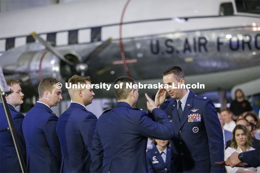 Lt. Col. C. J. Zaworski salutes the newly commissioned Second Lieutenants. The university’s Air Force ROTC detachment held a commissioning for May graduates at the Strategic Air Command and Aerospace Museum in Ashland. May 16, 2022. Photo by Craig Chandler / University Communication.