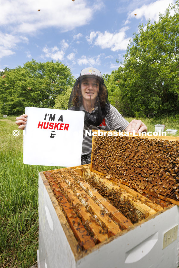 Rogan Tokach, a graduate student in entomology from Abilene, KS, studies bees and works with the UNL Bee Lab. Tokach is sporting a bee beard. May 31, 2022. Photo by Craig Chandler / University Communication.