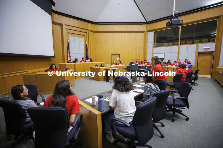 The defense team questions Mama Bear, played by Kyana Rios of Omaha South, during the of trial of Goldilocks vs the Three Bears. NCPA junior and senior high school students participate in a mock trial at Nebraska Law. June 9, 2022. Photo by Craig Chandler / University Communication.