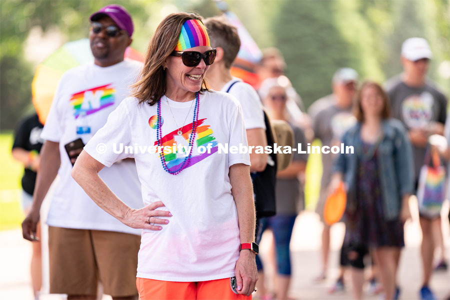 University of Nebraska representatives interact with members of the crowd during the Star City Pride parade. June 18, 2022. Photo by Jordan Opp for University Communication.