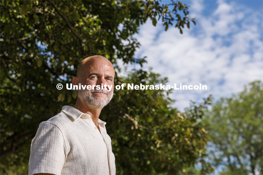 Timothy Schaffert, Professor of English, for PRIDE month profile about his time as both an UNL student and faculty member. June 27, 2022.  Photo by Craig Chandler / University Communication. 