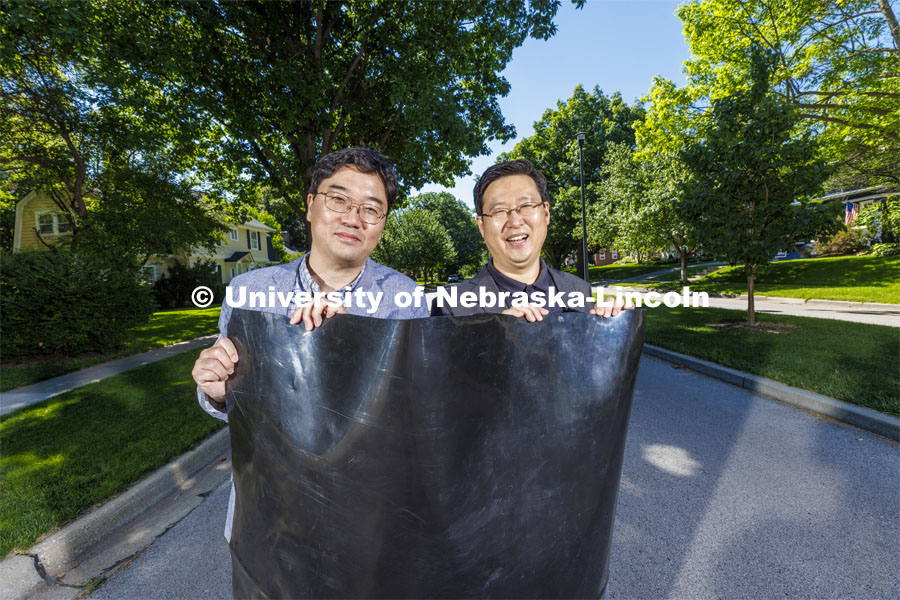 Jongwan Eun and Yunwoo Nam have developed a membrane that improve landfill gas emissions that make them and their communities better. June 28, 2022.  Photo by Craig Chandler / University Communication.
