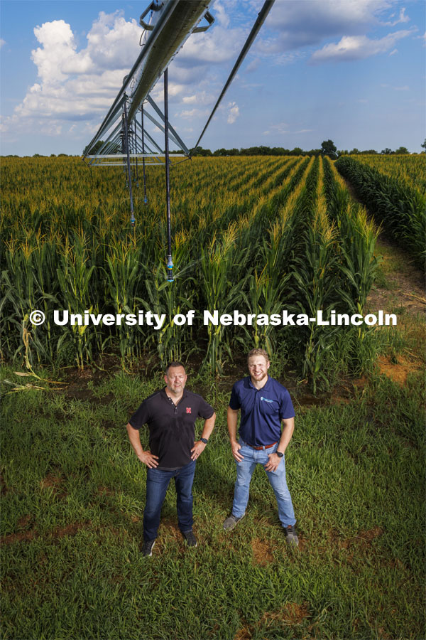 Joe Petsick, Executive in Residence and Assistant Professor of Practice and  Husker Venture Fund faculty advisor in the College of Business, stands with Jackson Stansell, founder and CEO of Sentinal Fertigation, . August 3, 2022. Photo by Craig Chandler / University Communication.