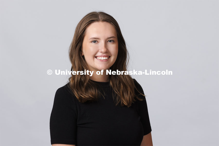 Studio portrait of Skylar Carlson, Admissions Counselor, Office of Admissions. August 3, 2022. Photo by Craig Chandler / University Communication.