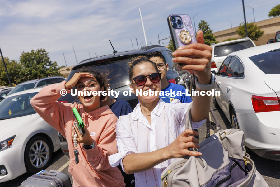 Gisell Duarte of Norfolk smiles for her a selfie by her mom, Maribel. Residence Hall move in for students participating in Greek Rush. August 14, 2022. Photo by Craig Chandler / University Communication.