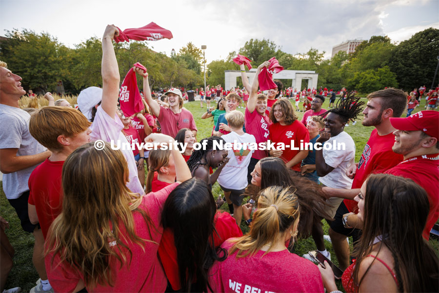 A group of students dance at the Chancellor’s BBQ to welcome the class of 2026 in the greenspace by the Nebraska Union. August 19, 2022. Photo by Craig Chandler / University Communication.